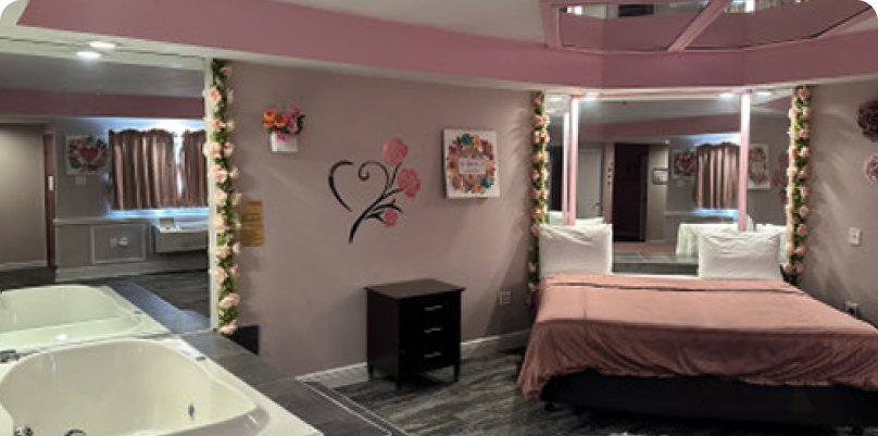 Rose Romantic Suite with Jetted Hot Tub & Fireplace