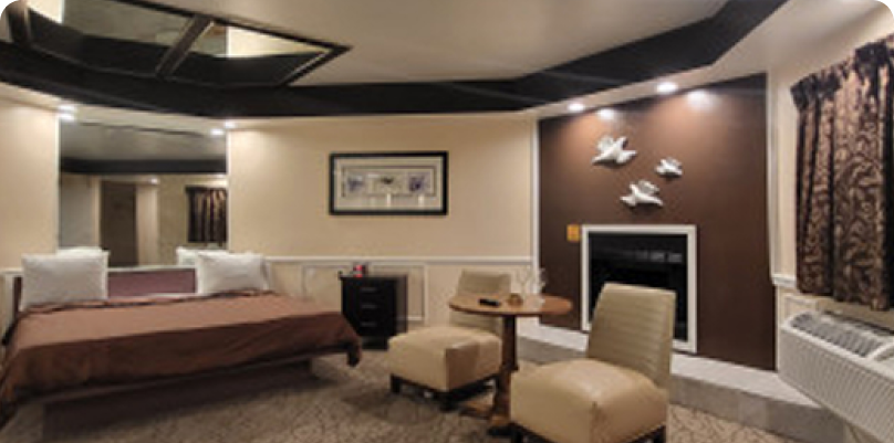 Deluxe Romantic Suite with Jetted Hot Tub and Fireplace